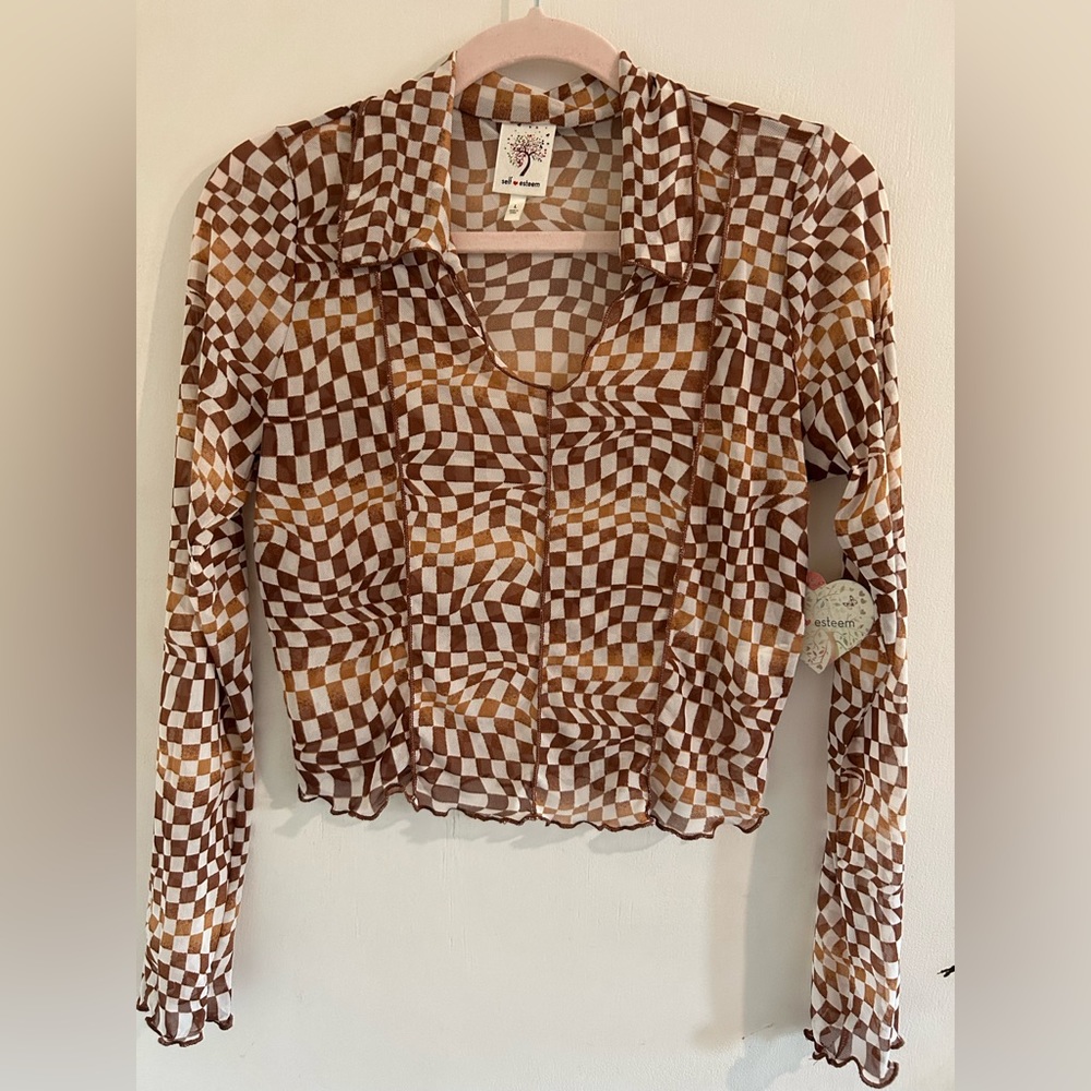 Brown checkered long sleeve shirt.